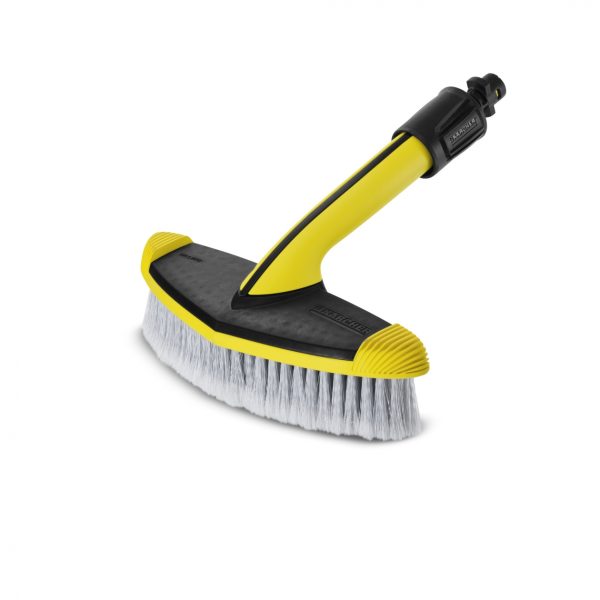 A yellow and black WB60 Soft Surface Wash Brush with a contoured handle and soft bristles isolated on a white background.