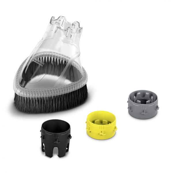 A clear scalp massaging brush with additional interchangeable Splash Guard bases in yellow and black, displayed on a white background.